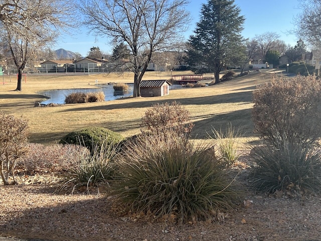 view of yard with a water view