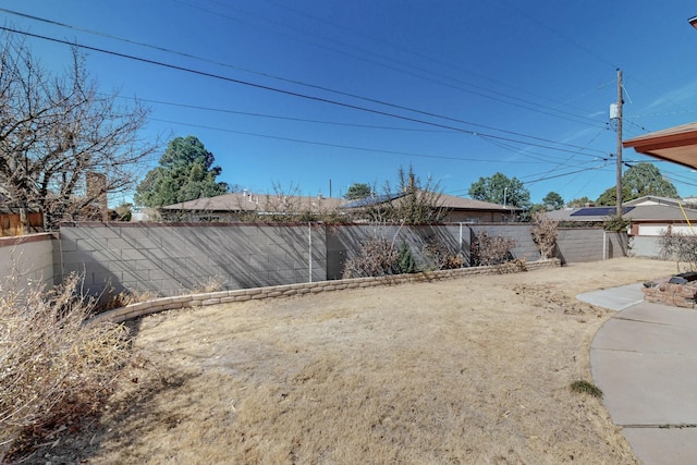 view of yard featuring a fenced backyard