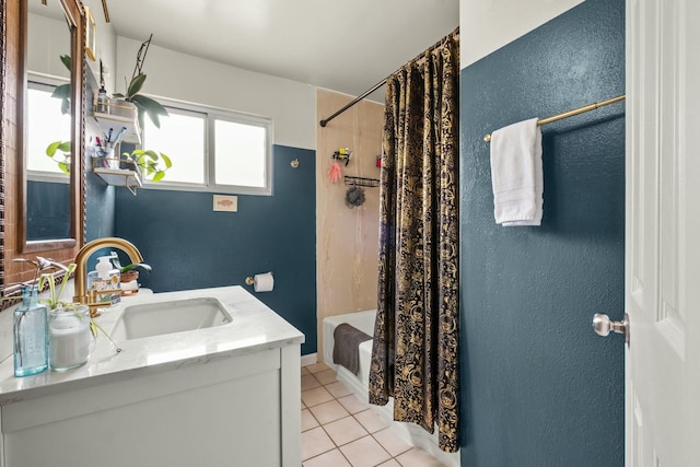 bathroom with shower / bath combination with curtain, vanity, and tile patterned floors