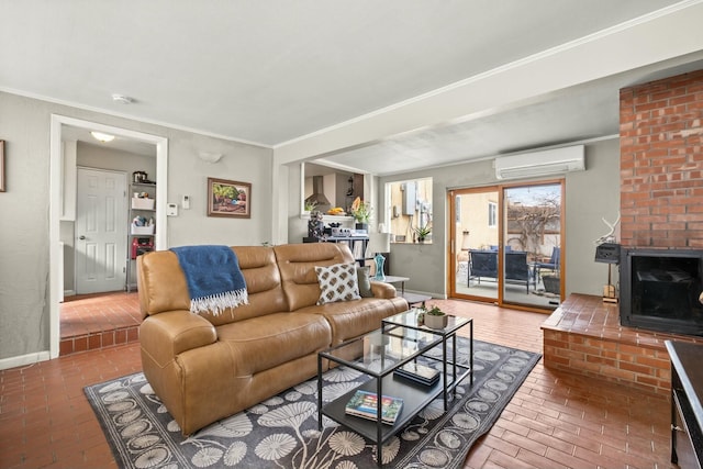 living room with crown molding, baseboards, brick floor, and a wall mounted AC