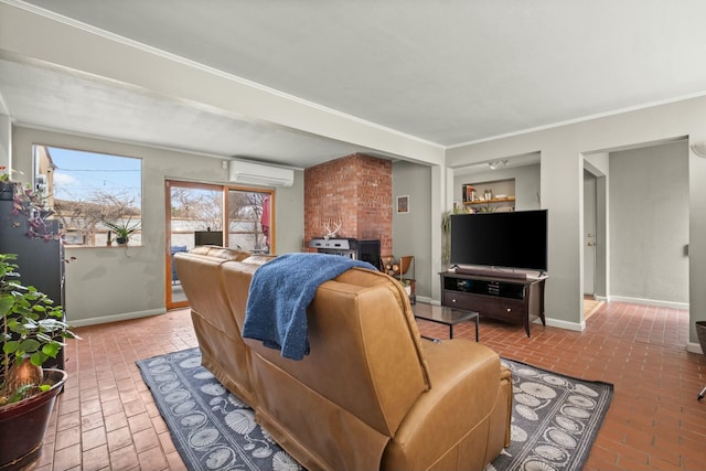 living area with baseboards, ornamental molding, brick floor, and a wall mounted air conditioner