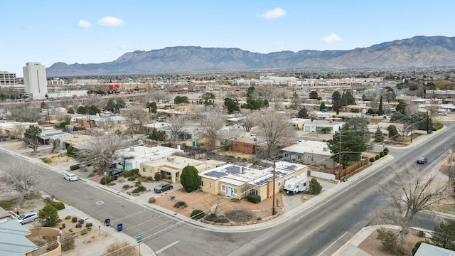 drone / aerial view featuring a mountain view