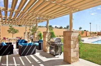 2721 Redondo Santa Fe Loop NE, Rio Rancho, NM 87144 - view of patio with a pergola, a fenced backyard, a community pool, and a grill