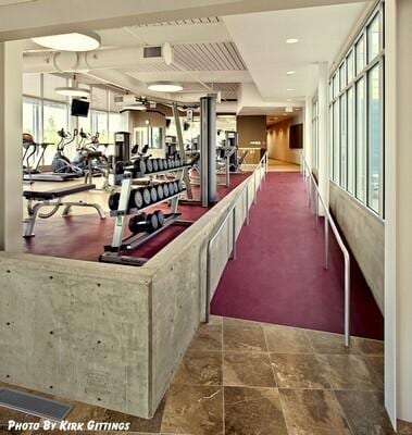 gym featuring a wealth of natural light