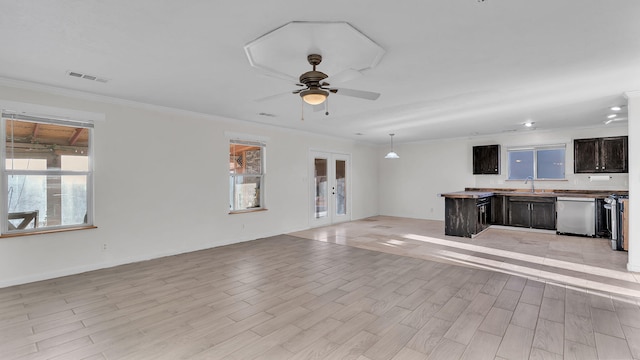 unfurnished living room featuring visible vents, a ceiling fan, french doors, light wood-type flooring, and a sink