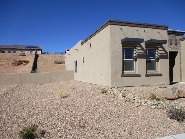 view of property exterior with stucco siding