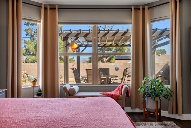 bedroom with wood finished floors