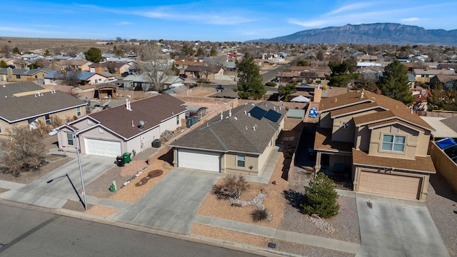 bird's eye view featuring a mountain view and a residential view