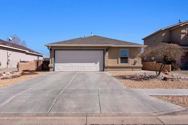 ranch-style home featuring stucco siding, a shingled roof, an attached garage, fence, and driveway