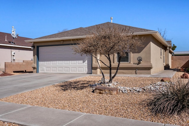 single story home with stucco siding, a shingled roof, concrete driveway, an attached garage, and fence