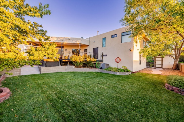 view of yard featuring central AC