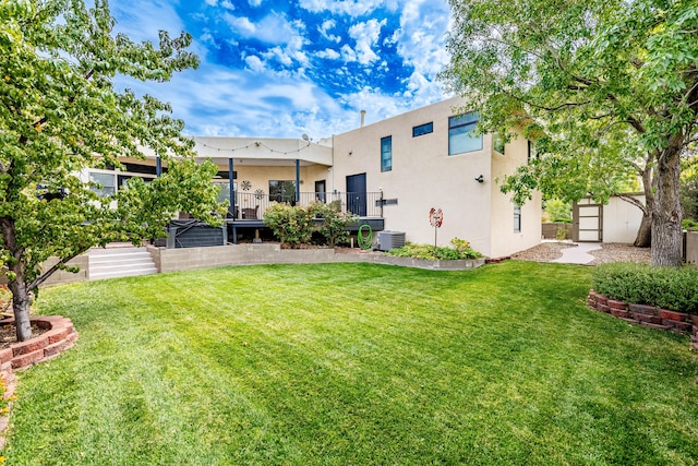 view of yard featuring central AC