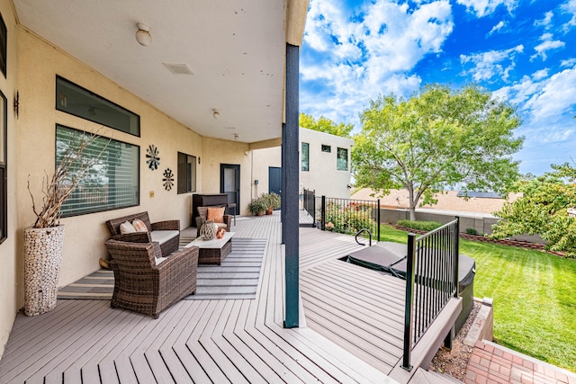 deck featuring a lawn and an outdoor living space