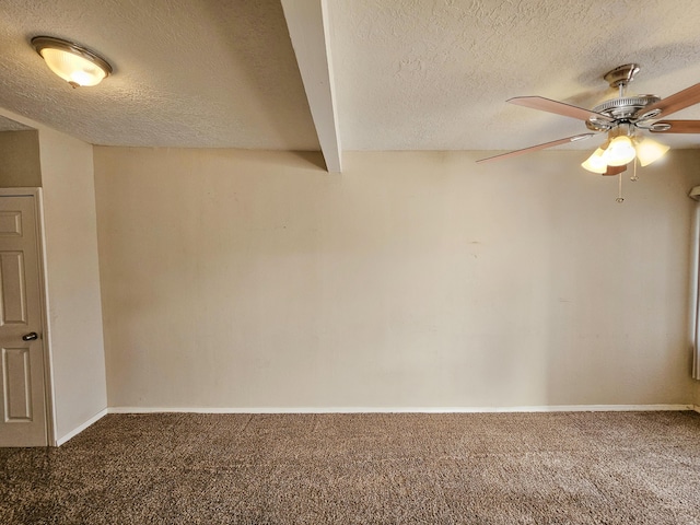 empty room with baseboards, a textured ceiling, and carpet flooring