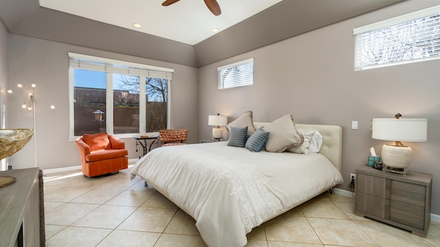 bedroom featuring ceiling fan, baseboards, and light tile patterned floors