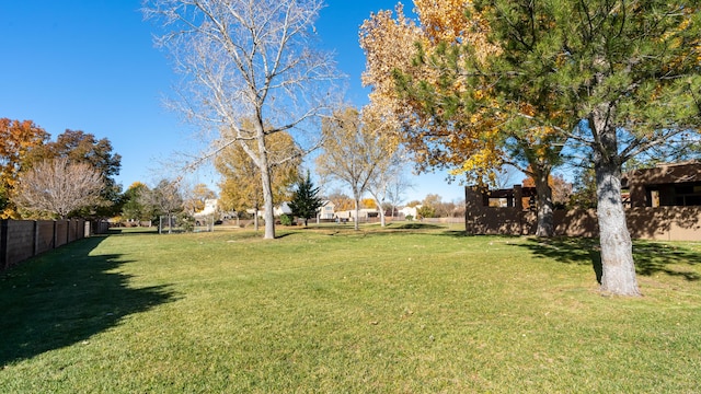 view of yard featuring fence