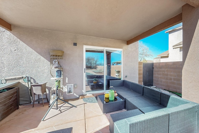 view of patio / terrace with outdoor lounge area and fence