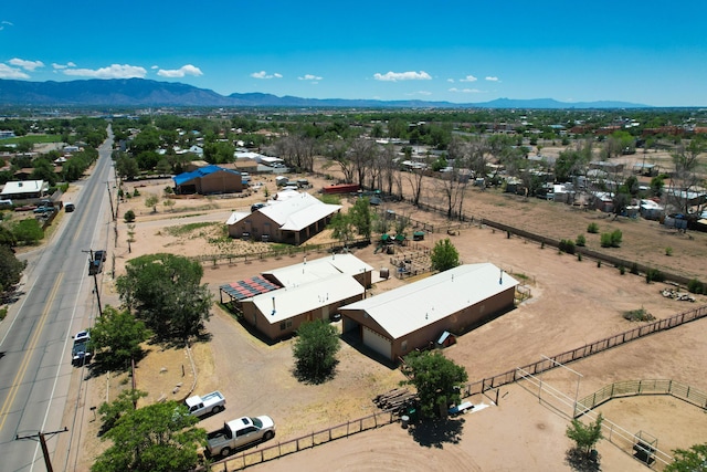 bird's eye view featuring a mountain view and a rural view