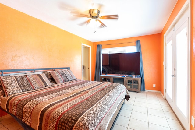 bedroom featuring light tile patterned flooring, ceiling fan, and baseboards