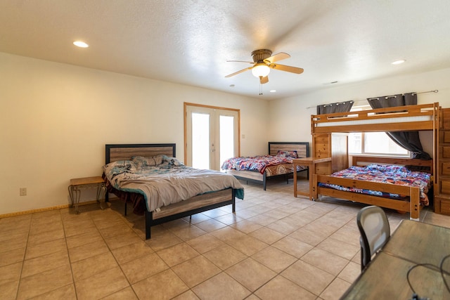 bedroom with french doors, light tile patterned flooring, and multiple windows