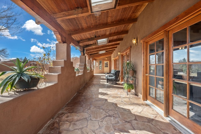 view of patio with a balcony