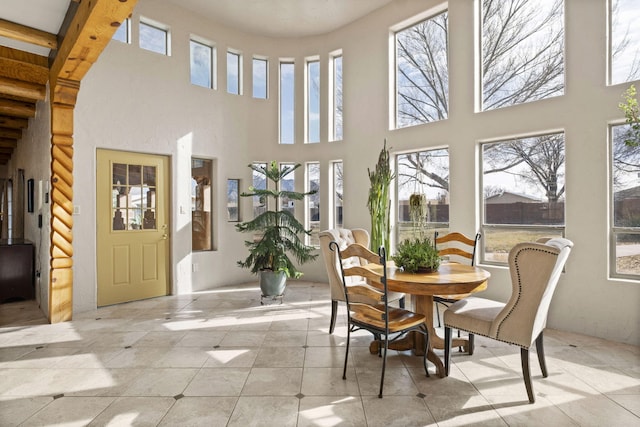 sunroom featuring plenty of natural light