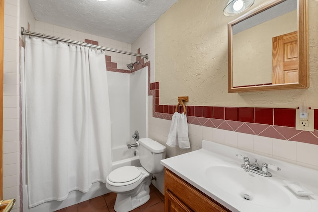 full bath with a textured ceiling, a textured wall, toilet, tile walls, and shower / bathtub combination with curtain