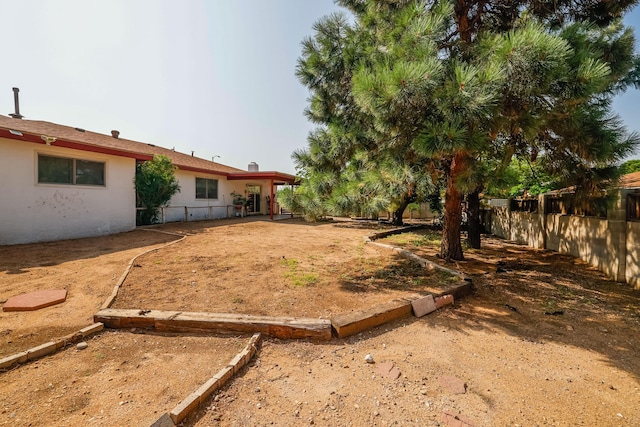 view of yard featuring fence