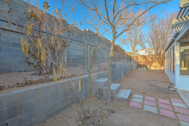 view of yard featuring a fenced backyard