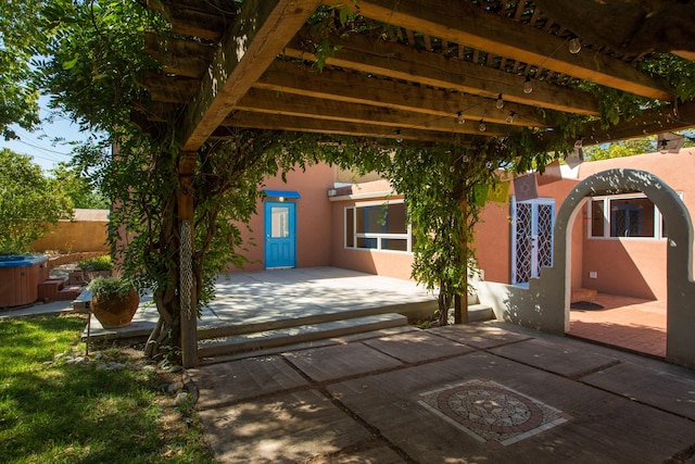 view of patio / terrace featuring fence and a pergola