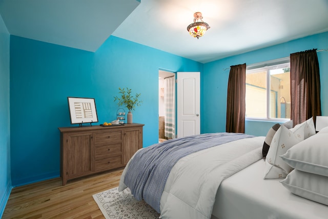 bedroom with light wood-style floors