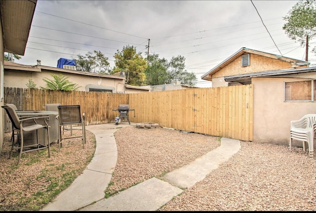 view of yard with a patio area and fence