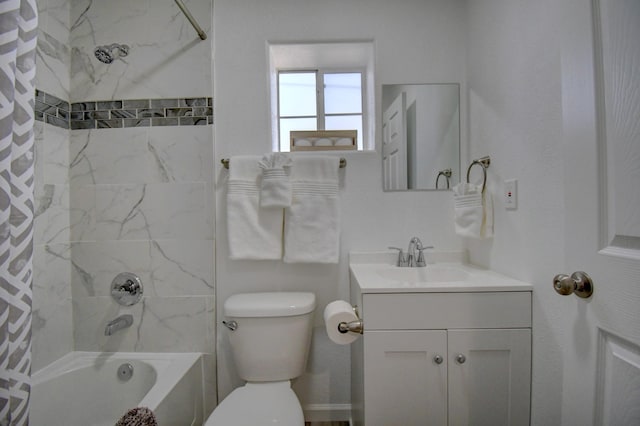 full bath with shower / bath combination with curtain, vanity, and toilet