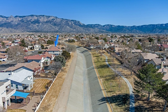 bird's eye view featuring a mountain view and a residential view