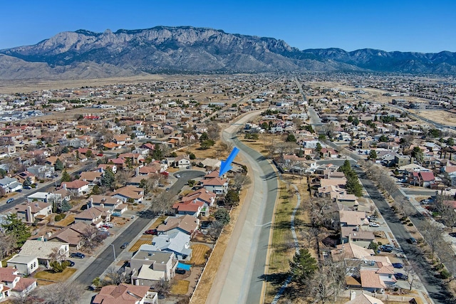 birds eye view of property featuring a residential view and a mountain view