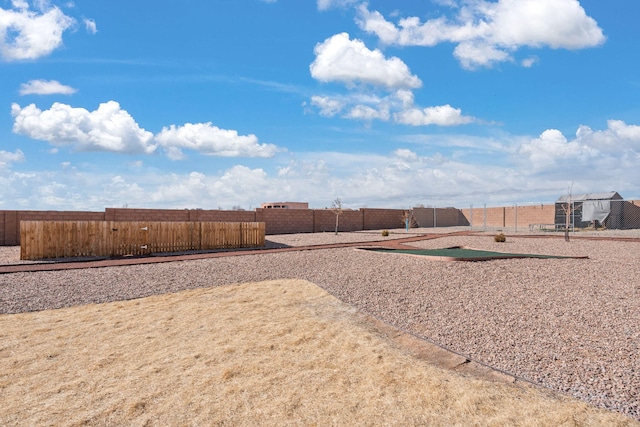 view of yard featuring fence