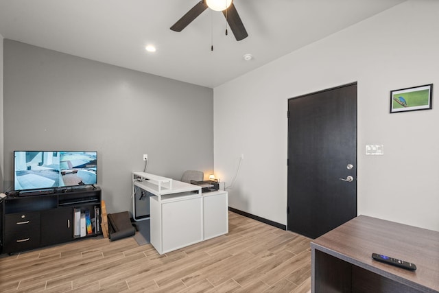 office area with a ceiling fan, recessed lighting, and light wood finished floors