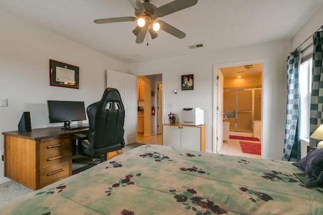 bedroom with light tile patterned floors and visible vents