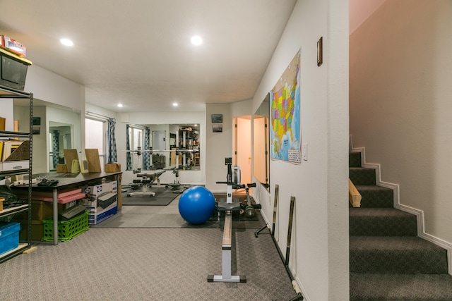 workout room featuring recessed lighting