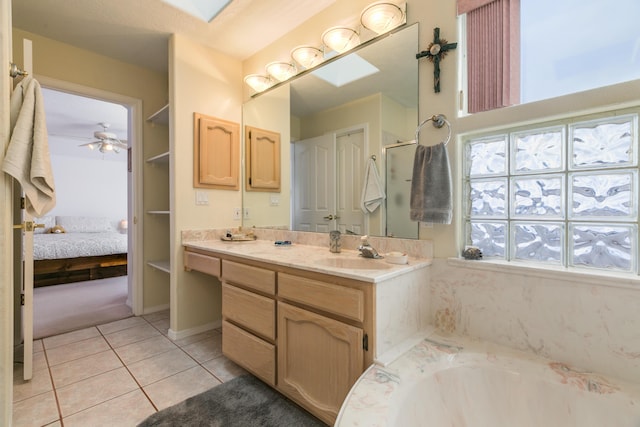 full bath featuring vanity, tile patterned flooring, a shower, a bath, and connected bathroom