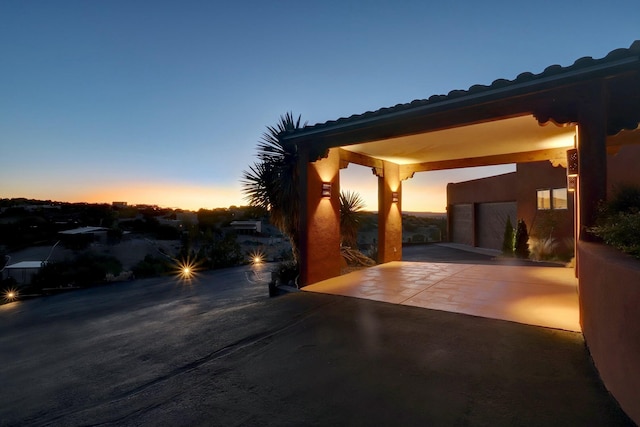 7 Calle Cholla, Placitas, NM 87043 - view of garage at dusk