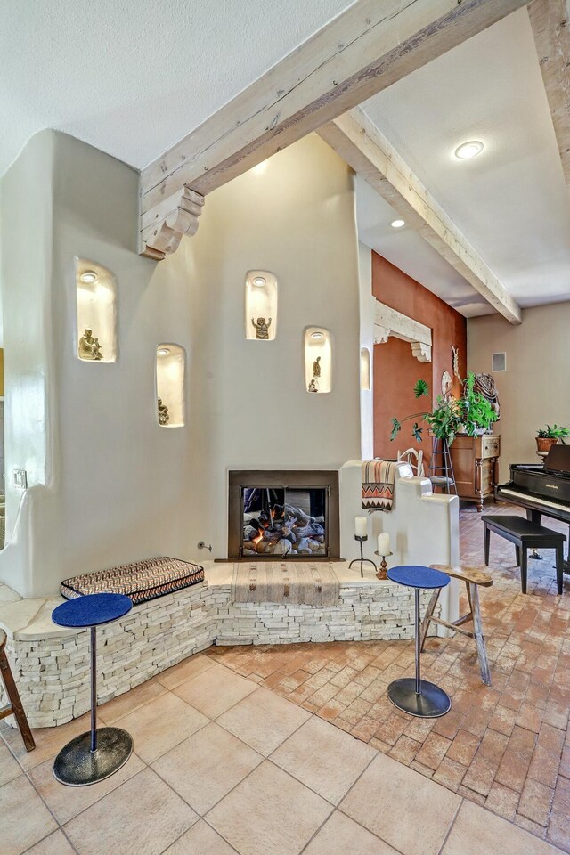 7 Calle Cholla, Placitas, NM 87043 - living room featuring a stone fireplace
