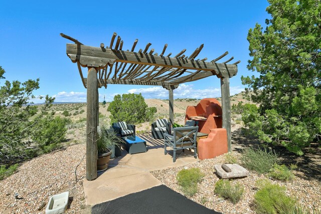 7 Calle Cholla, Placitas, NM 87043 - view of patio with a pergola