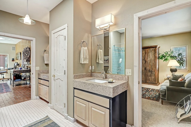 full bathroom with a shower with shower curtain and vanity