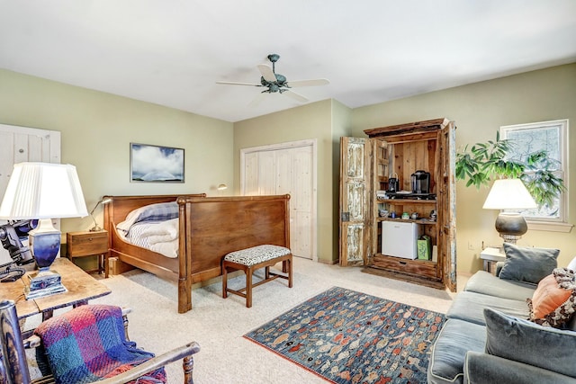 carpeted bedroom with a closet and ceiling fan