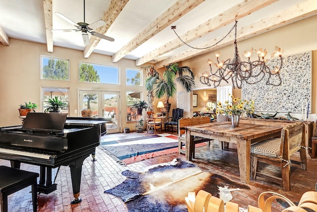 dining space with brick floor, beam ceiling, and ceiling fan with notable chandelier