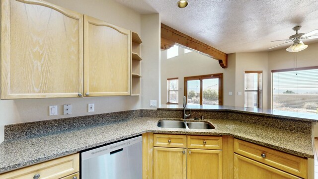 kitchen featuring dishwasher, light stone countertops, a textured ceiling, open shelves, and a sink