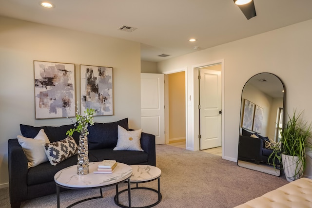 living area featuring recessed lighting, baseboards, visible vents, and carpet flooring