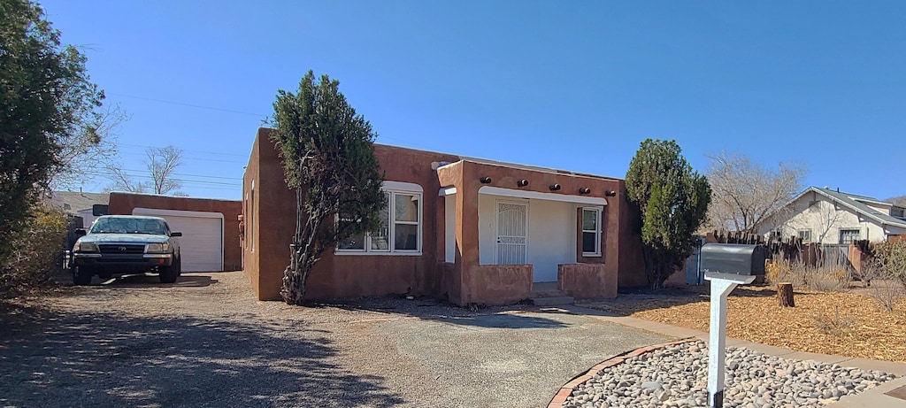 view of front of home with fence