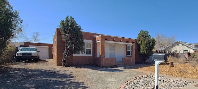 view of front of home with fence